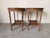 Elegant Louis XVI style side tables featuring oval tops. Their refined neoclassical details paired with a warm distressed...