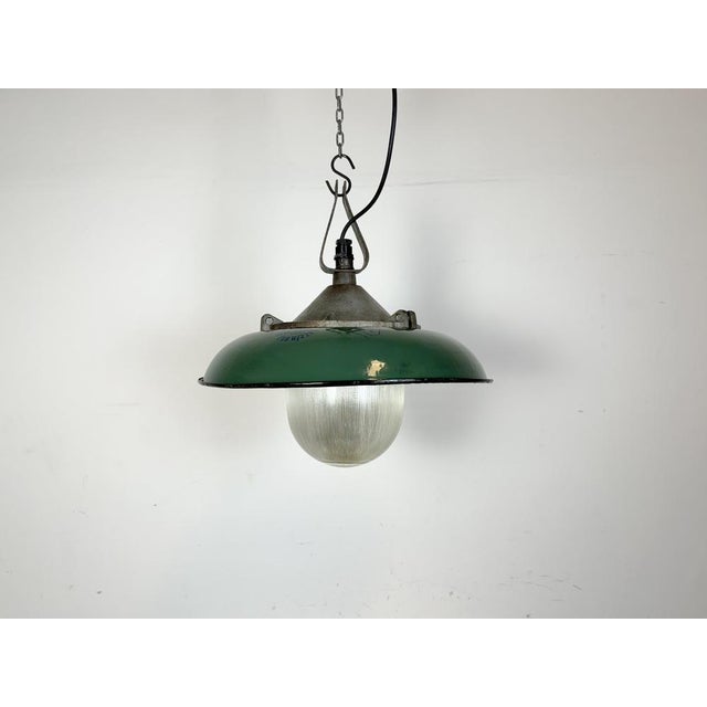 - industrial factory pendant lamp in cast iron. - manufactured by a23 factory in wilkasy in poland during the 1960s. -...