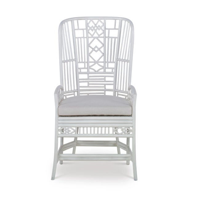Rattan frame finished in an off-white with flax colored upholstery Assembly Required? No Care Instructions: Dust with a...