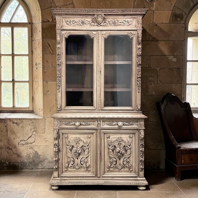 19th Century French Renaissance Revival Carved Oak Bookcase ~ Cabinet in Stripped Oak is beautifully crafted, executed in...