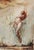 This watercolor artwork portrays a figure suspended in a dreamlike state, surrounded by delicate aquatic plants that evoke...