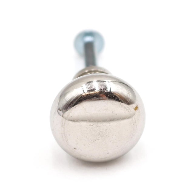 Classic style cabinet or drawer knob made of chrome finished brass. A mounting screw is included. Good condition with...