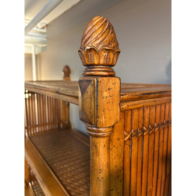 Handsome beautifully made honey colored bamboo and woven rattan bookcase with substantial heavy wood structure having 4...