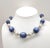 This is part of Chairish’s Costume Jewelry assortment. 1950s rhodium plated resin blue moonglow and faux-pearl with...