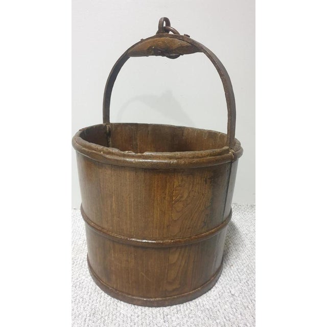 This is a very nice 19th Century antique oak log bin, iron bound with iron handle, in excellent condition.