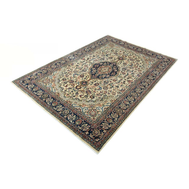 A noble and finely knotted Sarough oriental rug with a classic medallion design, made from high-quality cork wool - known...