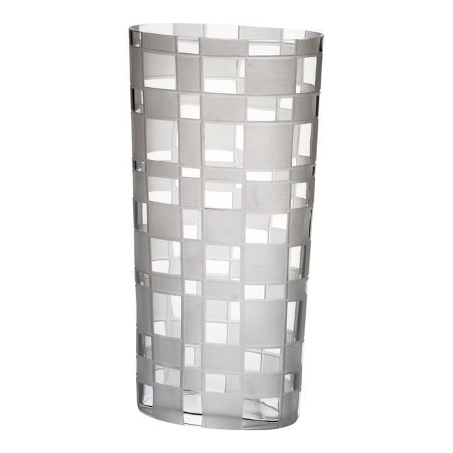 Oval free hand shaped vase in transparent Murano glass with detailed hand cut irregular chequered opaque squares designed...