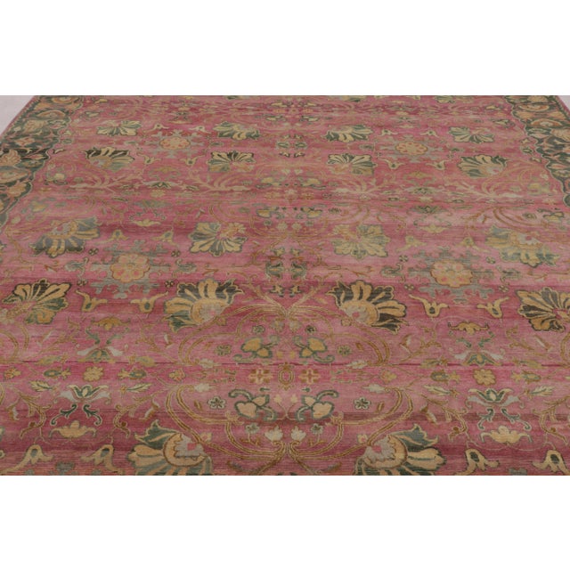 Hand-knotted in wool, this 9x14 area rug from Rug & Kilim’s Modern Collection is a vibrant exploration of large-scale...