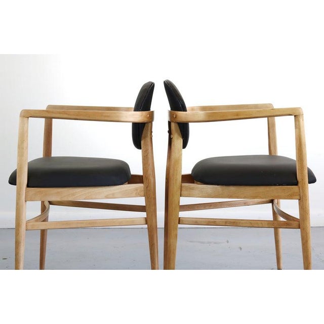 Gorgeous and entirely one of a kind set of arm chairs by Heywood Wakefield. They maintain thier tags, but good luck...