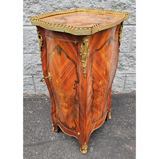 Louis XV Brass Mounted Parquetry and Satinwood Inlaid Galleried Top Side Table. Good storage capacity for small items with...