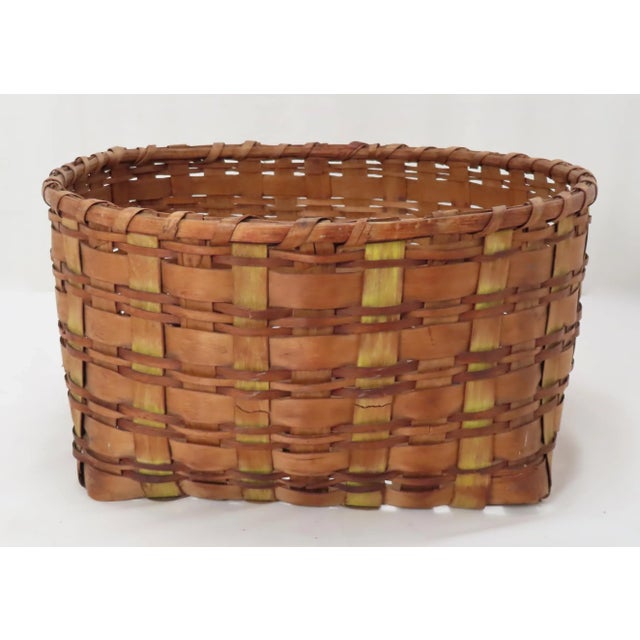 This is a Very Nice Looking Large Size Antique Country Primitive Wood Splint Basket. Circa Late 19th Century. It is...