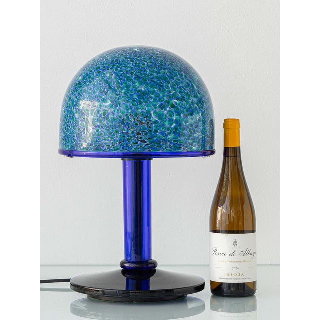 Designed by Italian architect and designer Gae Aulenti (1927–2012) for Vistosi, this striking blue Murano glass murrine...