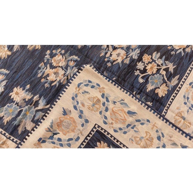 Rich with historical depth and artisanal charm, this 19th-century antique Russian Bessarabian rug exemplifies the romantic...