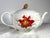 Celebrate the cozy charm of the season with this elegant Lenox “Winter Meadow” teapot. Featuring festive poinsettias,...