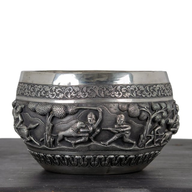 A large repoussé silver ceremonial hunting bowl, Lucknow, North India, Raj Period, late 19th century. Five scenes...