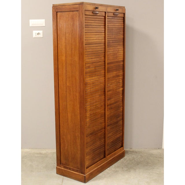 Double-shutter filing cabinet Made of oak First half of the 20th century Dimensions: width 84 cm, depth 38 cm, height 180...
