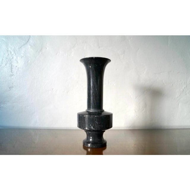 Vintage solid marble vase for sale. Heavy and beautifully sculpted. In great condition. Beautiful sculpted shape in a dark...