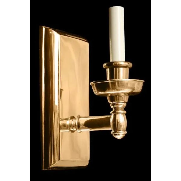 Storia Single - Neo-classical Style. Made of cast brass, with beveled backplate detailing, and curved arm.