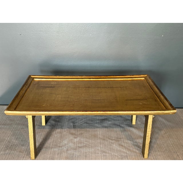Offered for your consideration, this footed lap tray with folding legs with nice mid-century lines. 23”w 15.25”d x 2.5”h...