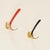 Wonderful and unique set of four Mid-Century coat hooks entirely crafted from solid brass and enriched with black and...