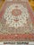"A late 20th century Persian Tabriz room size rug in a floral pattern. This beautiful rug features a classic floral...