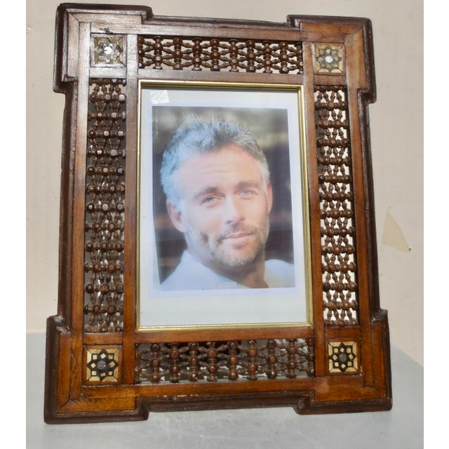 Antique desktop frame with back stand. The corners are inset with mother-of-pearl and bone. Each side is composed of woven...
