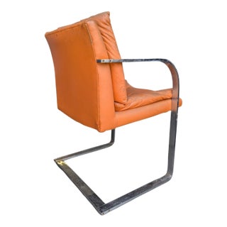 Vintage Chrome-Finish Steel Cantilever Lounge Chair in Orange Vinyl For Sale