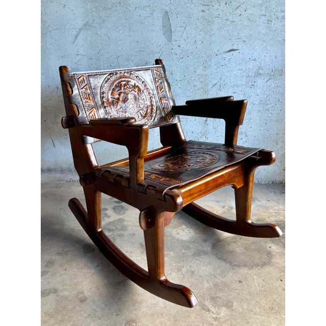 A sculptural vintage rocking chair by Angel Pazmino, the celebrated Ecuadorian designer known for his masterful...
