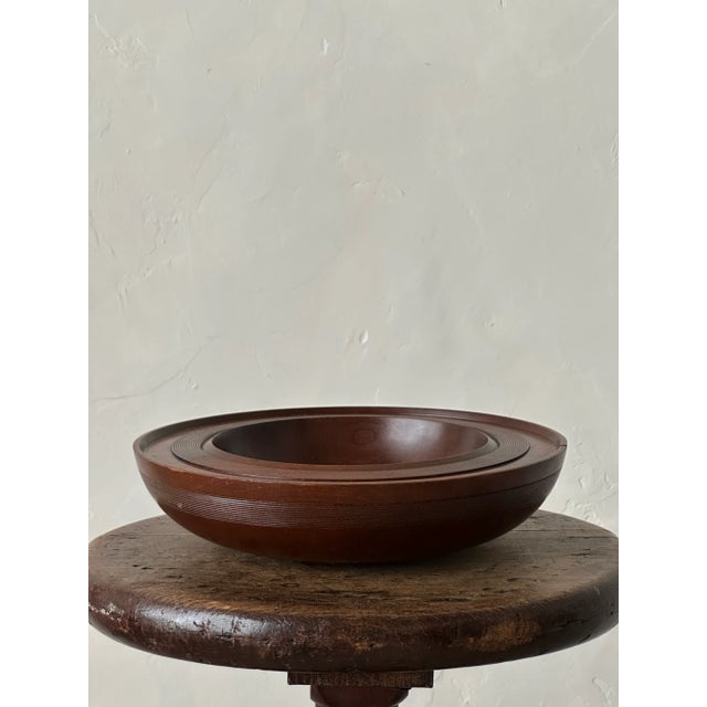 Very fine hand turned wooden bowl with intricate line work. Made using the Brazilian hardwood Imbuya. Signed and numbered...