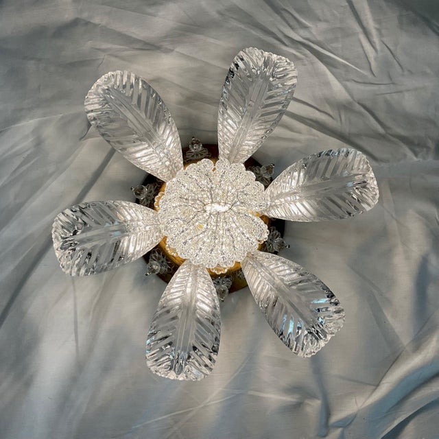 Bring instant sparkle and retro glamour to your space with this stunning vintage floral ceiling light. Featuring a layered...