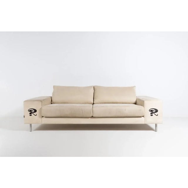Unique ‘Raun Home’ sofa upholstered in beige alcantara fabric, brushed steel legs. It was specially made for Robbie...