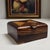Small objects tell the most compelling stories. This richly grained, handmade Cocobolo trinket box is attributed to the...