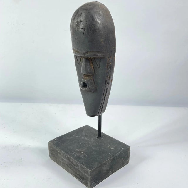 The Toma masks, exquisite and culturally significant, are striking embodiments of artistic prowess within the traditions...