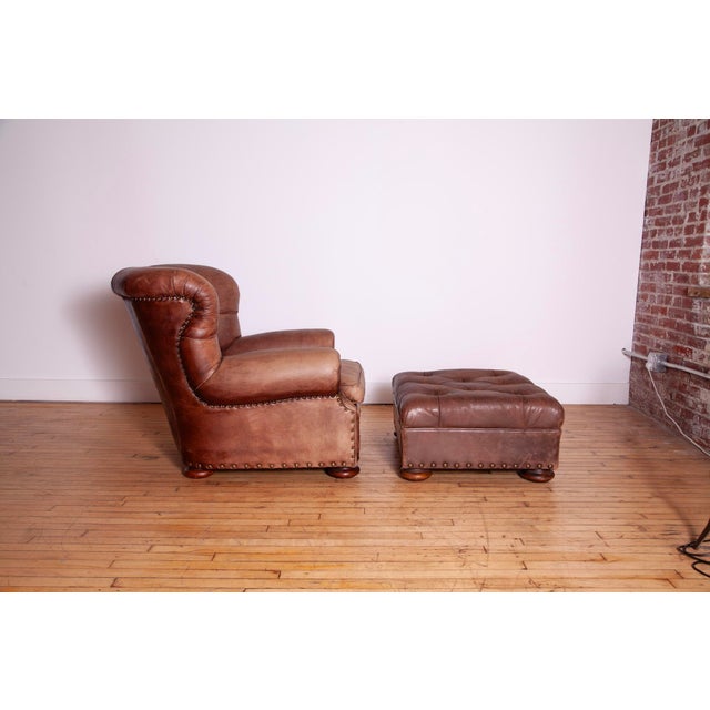 Emblematic of Ralph Lauren’s iconic and enduring style, this winged Writer's club chair is masterfully constructed with...