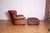 Emblematic of Ralph Lauren’s iconic and enduring style, this winged Writer's club chair is masterfully constructed with...