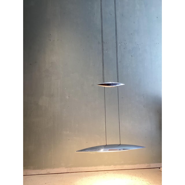 This elegant Aluminium Tai Lang pendant was designed by Tobias Grau. The heigh made product . The soft light from the led...