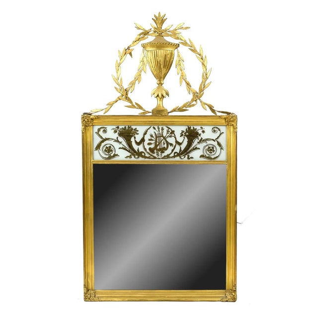 Period American Federal Mirror. Giltwood and Eglomise in Neoclassical Style. Original gilding. Wonderful Urn Pediment. Ex...