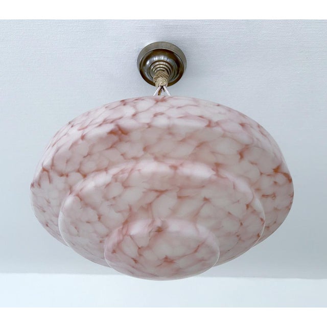 Stunning 1930s Art Deco pendant light with a stepped mottled light pink and white glass shade Mounted on a matching...