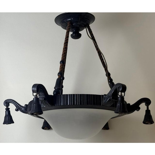 This huge art deco chandelier impresses with its size and imposing appearance. Admire the beautiful, perfectly curved...
