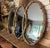 A grand-scale triptych mirror by Bassett Mirror Company, the noted Virginia maker, in the quintessential Hollywood Regency...