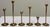 Set of six (6) vintage mid century modern tulip brass candlesticks of ascending height. Shortest 3"H, tallest 8.75"H....