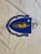 This is a late 20th century vintage Massachusetts State Flag. It features the blue coat of arms with a white star and...