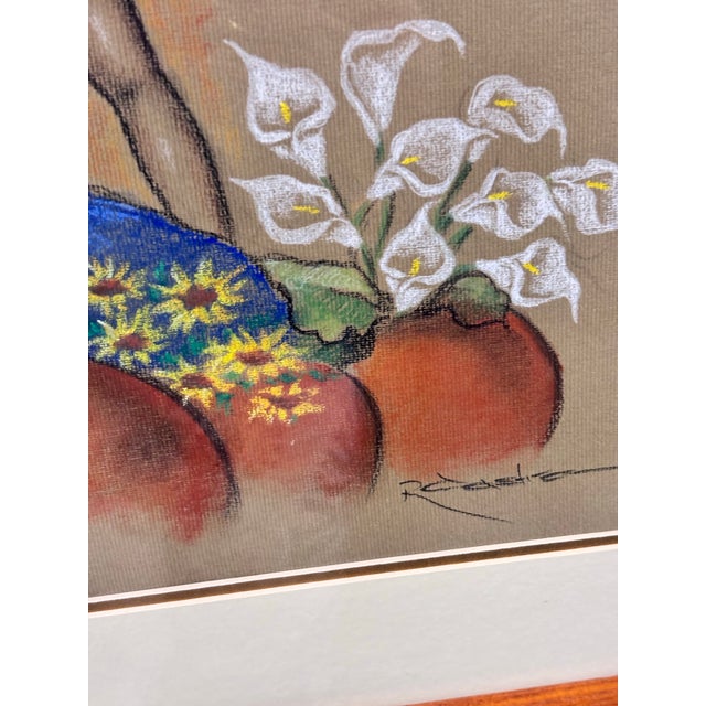 Features a pensive female figure rendered in soft earth tones with graceful drapery.Accented with earthen vessels and...
