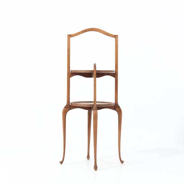 Wonderful and rare Queen Anne style cake stand. Design by H. Pander & Zonen. Striking Dutch design from the 1920s. Solid...