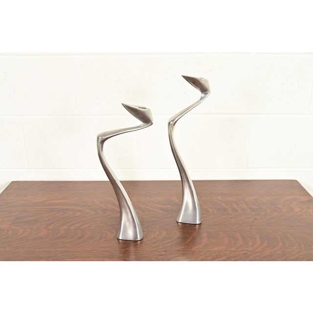 A gorgeous pair of Postmodern or Brutalist aluminum "swan" candlesticks By Matthew Hilton for SCP England (signed to base)...