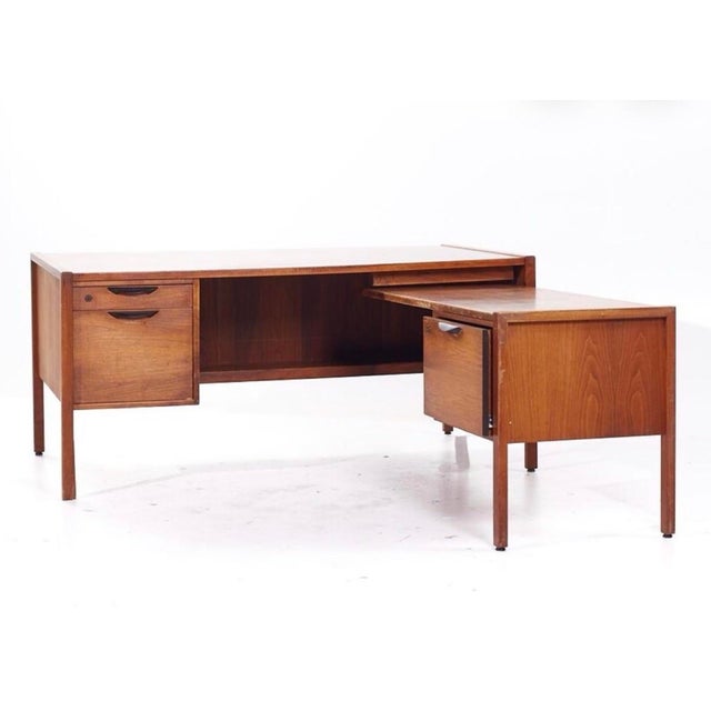 Beautiful 1960s Jens Rinsom Executive Corner Desk with return in a rich walnut. In good vintage condition with age...