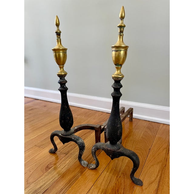 Featuring an iron base and a brass top, these pieces can serve as both a functional wood rack or a stunning piece of decor...
