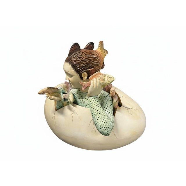 A captivating and whimsical surrealist sculpture by the celebrated Mexican artist Sergio Bustamante (b. 1949). This iconic...