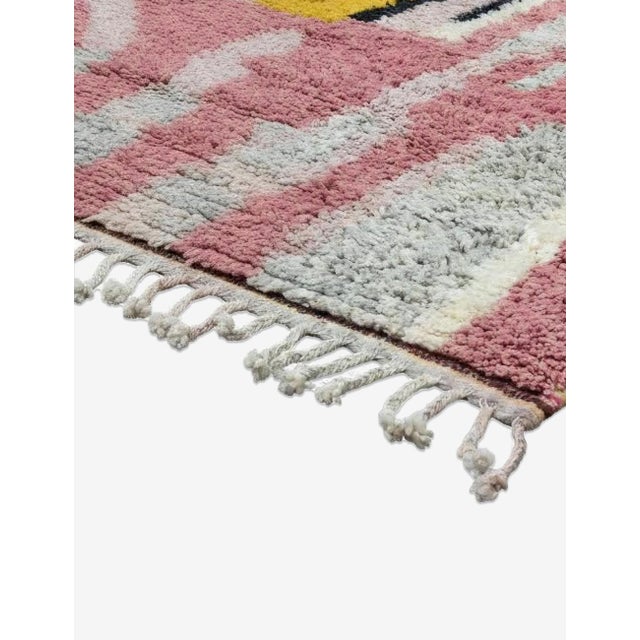 Boujad Rug | Handwoven Berber Wool Rug with Striped Color-Block Design This graphic Boujad rug features a bold striped...