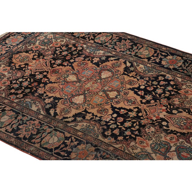 Hand-knotted in wool and originating from Persia, circa 1920-1930, this 3x5 special Persian Farahan rug is a bold new...